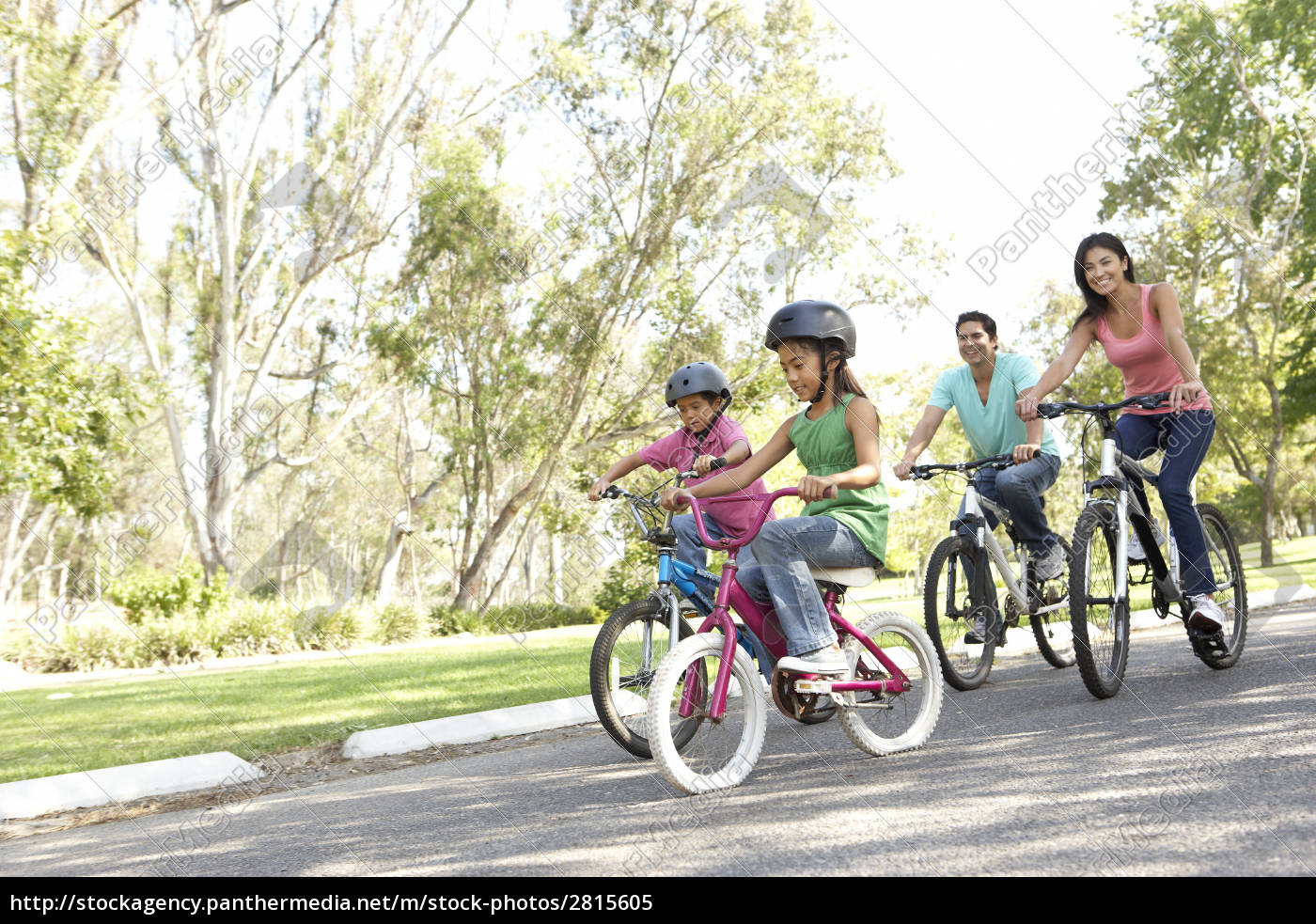 family riding bikes