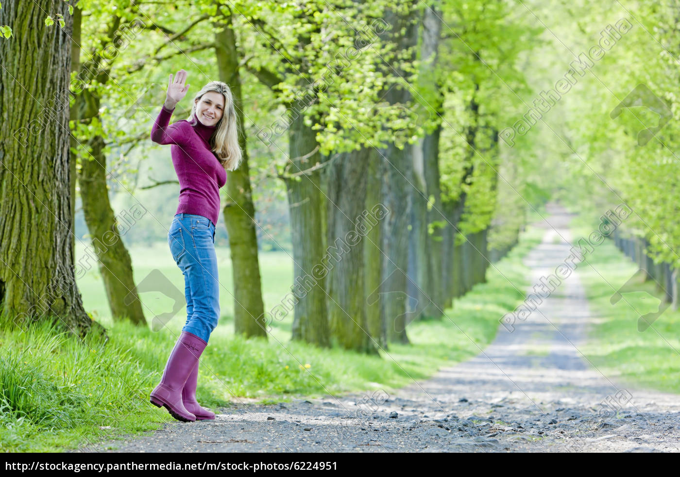 woman wearing rubber boots in spring 