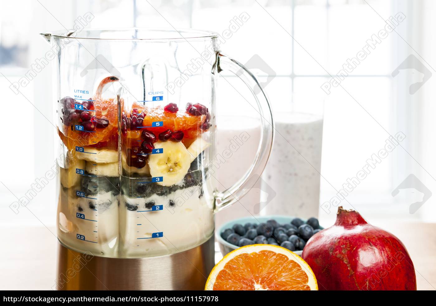 Blender With Assortment Of Fruits Stock Photo, Picture and Royalty