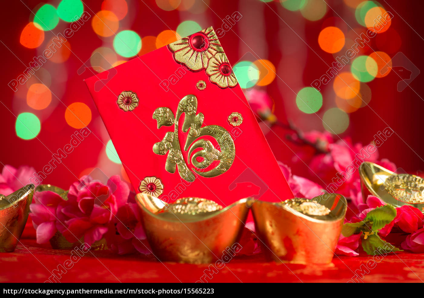 Chinese New Year Decorations Gold Ingots And Red Packet Stock