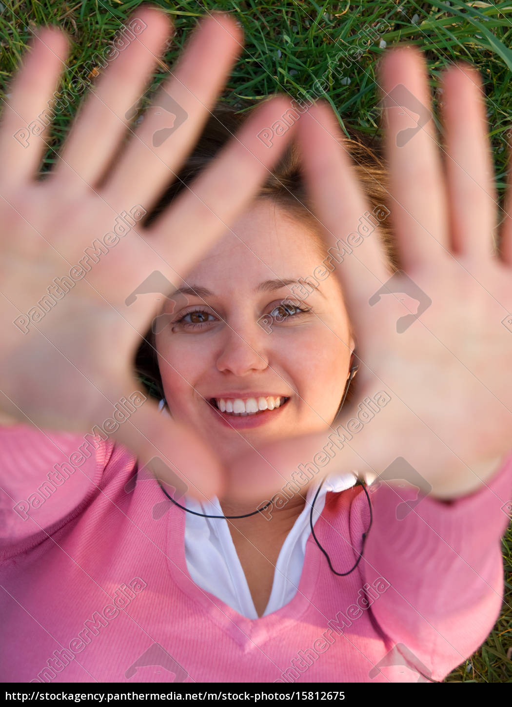 teenage-girl-lying-on-grass-stock-photo-15812675-panthermedia