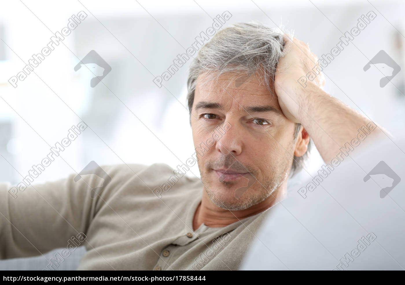 Portrait Of Attractive Mature Man Relaxing At Home Royalty Free