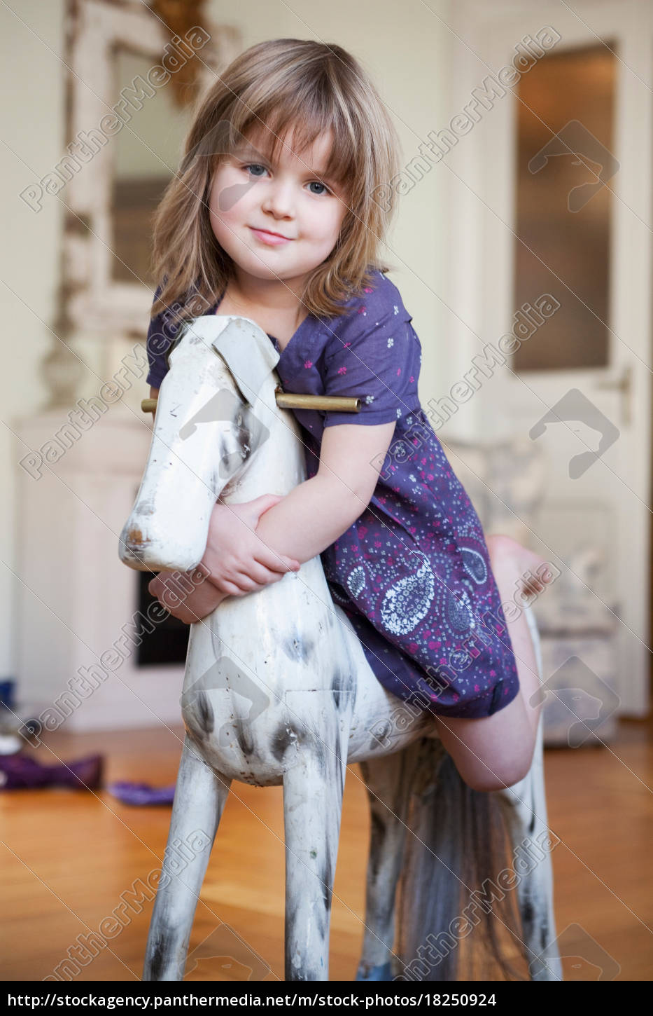 little girl rocking horse