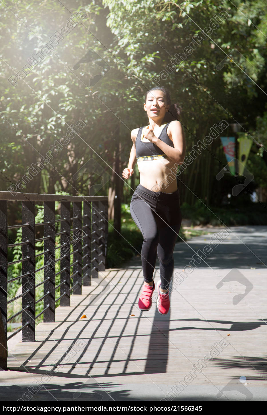 Fit and Healthy Chinese woman running 