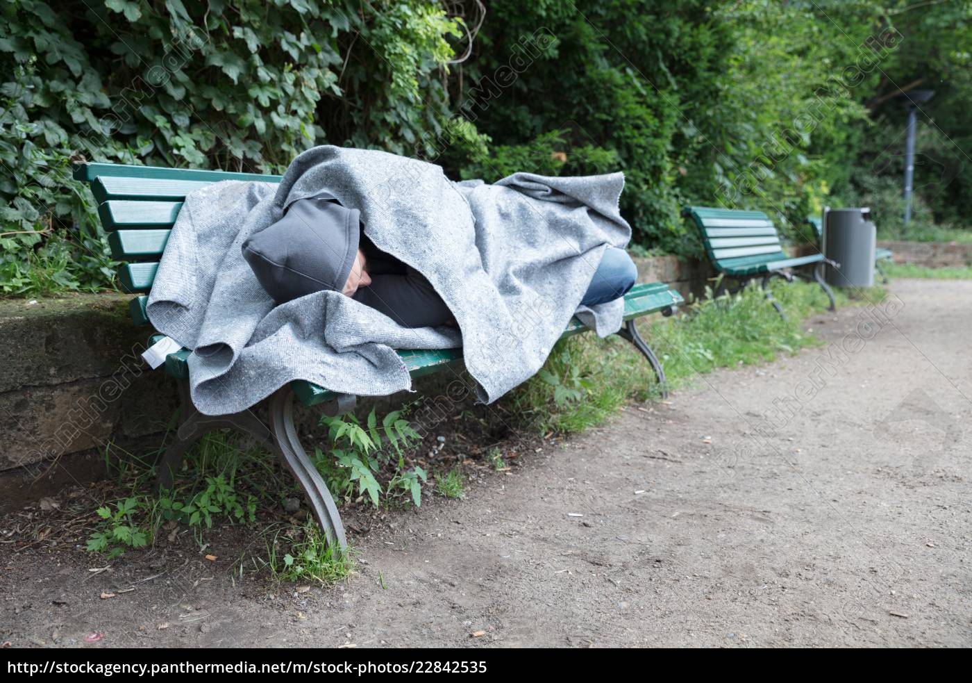 Homeless Man Sleeping On Bench Stock Photo Panthermedia Stock Agency