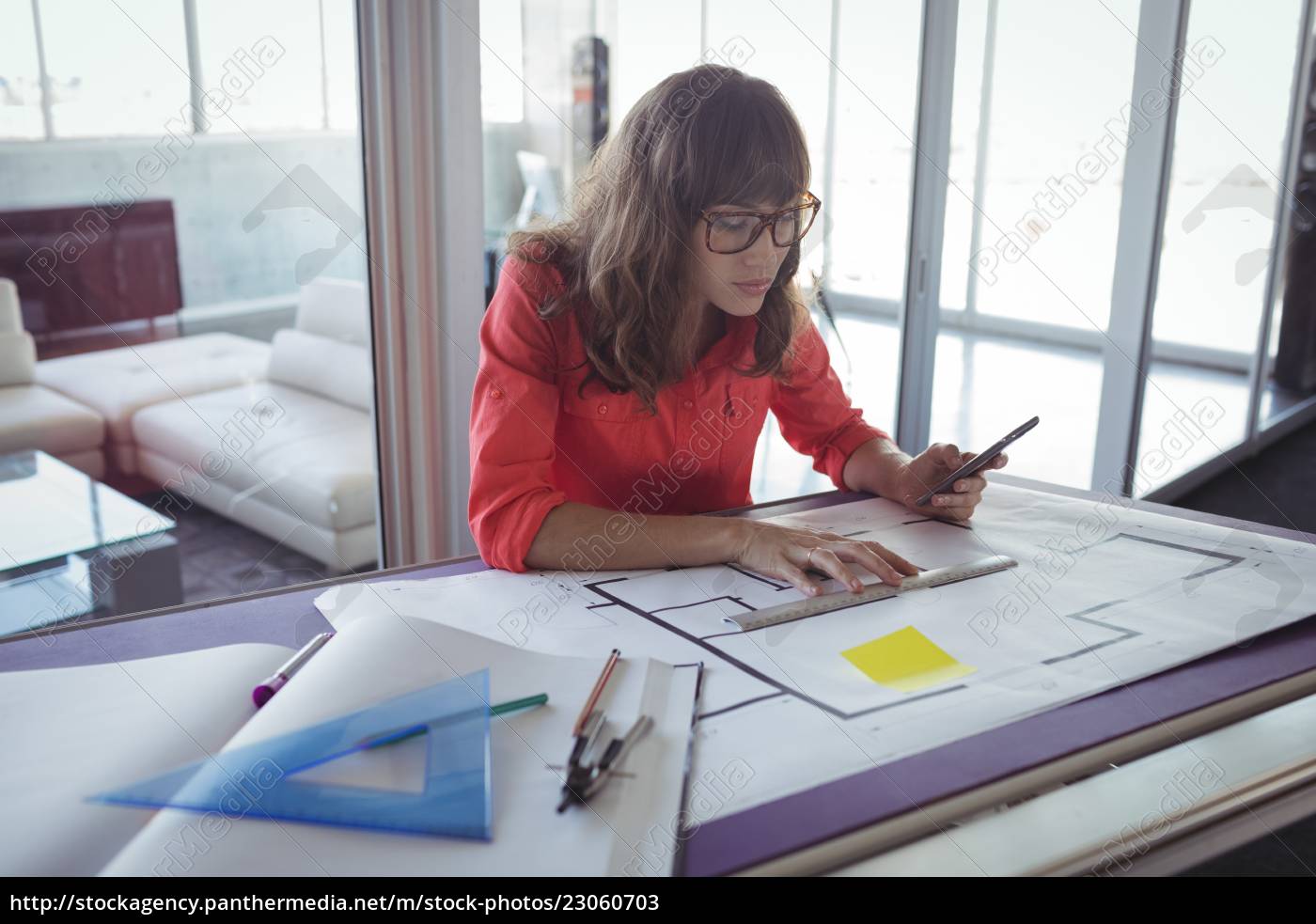 Royalty Free Image 23060703 Female Interior Designer Making Plans On Papers