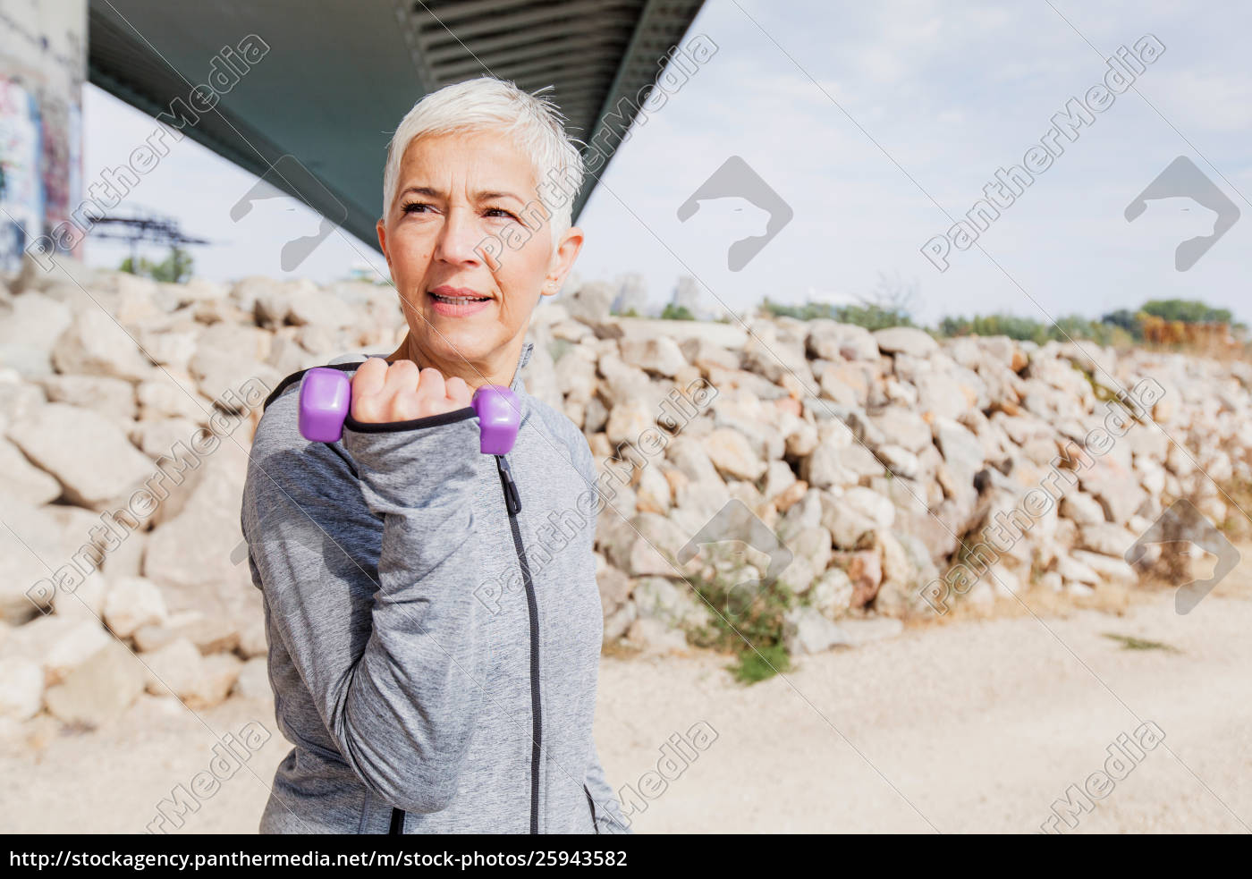 Healthy Mature Woman Exercise With Weights Stock Image