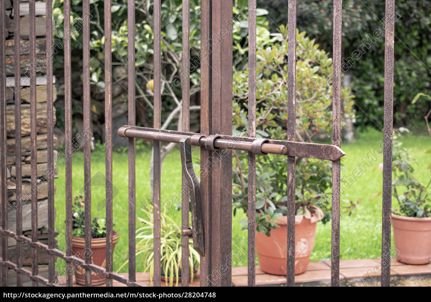 Metal Gate With Sliding Bar To Block Access To A Garden Royalty Free Photo 4748 Panthermedia Stock Agency