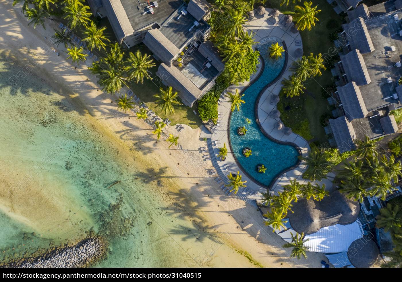 Aerial view of a swimming pool along the coast near - Stock Photo ...